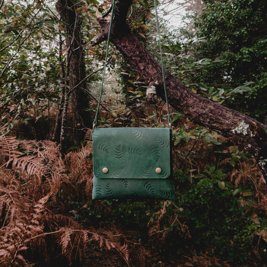 green botanical leather bag, lifestyle photo 