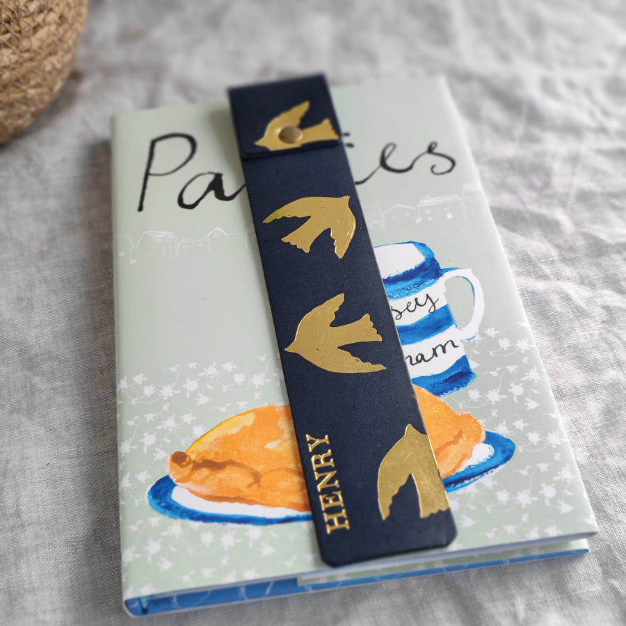 gold and navy leather bookmark