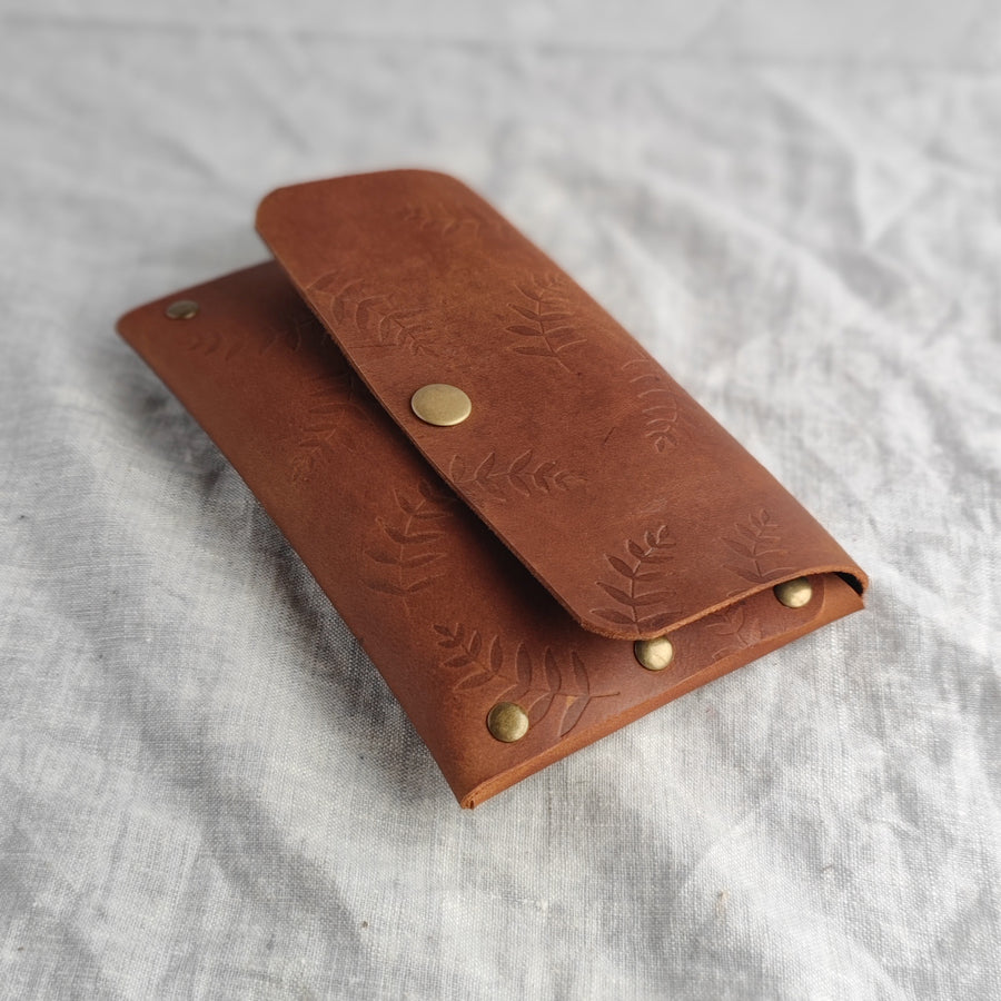 side view of leather passport holder 