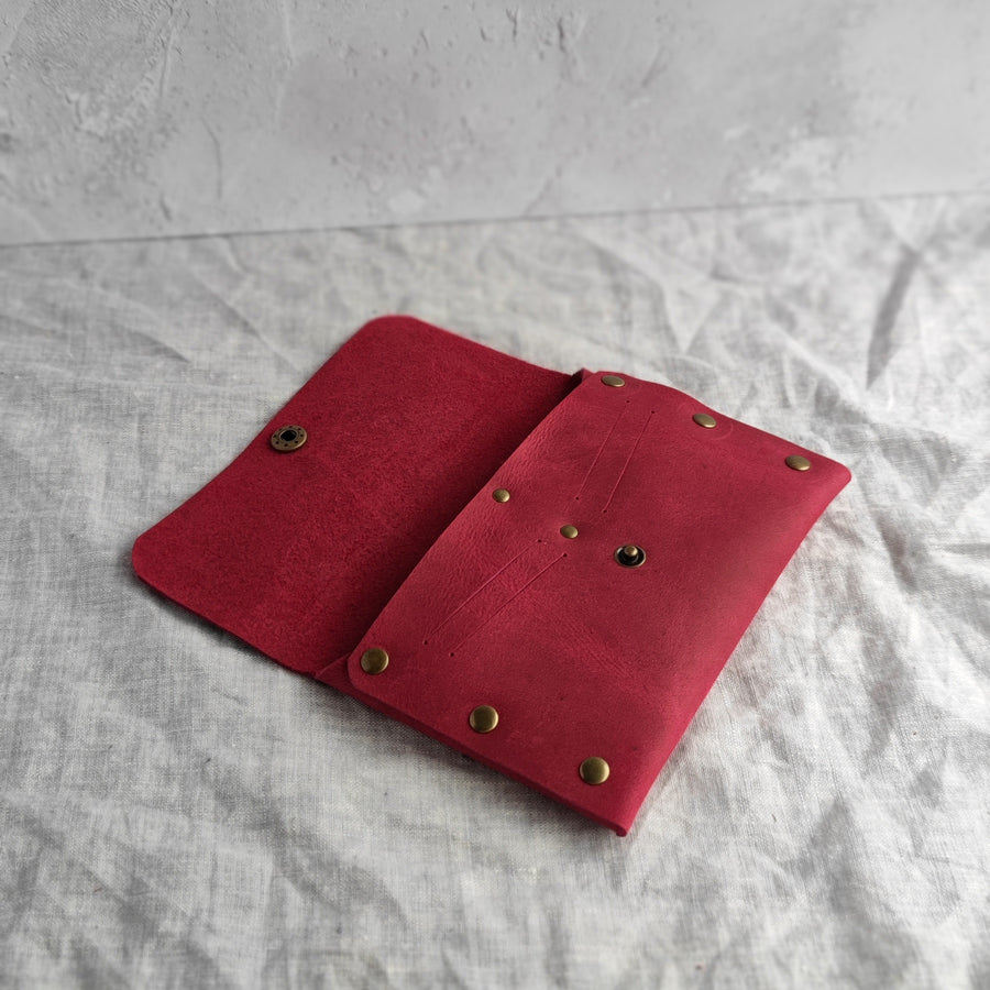red leather passport holder 