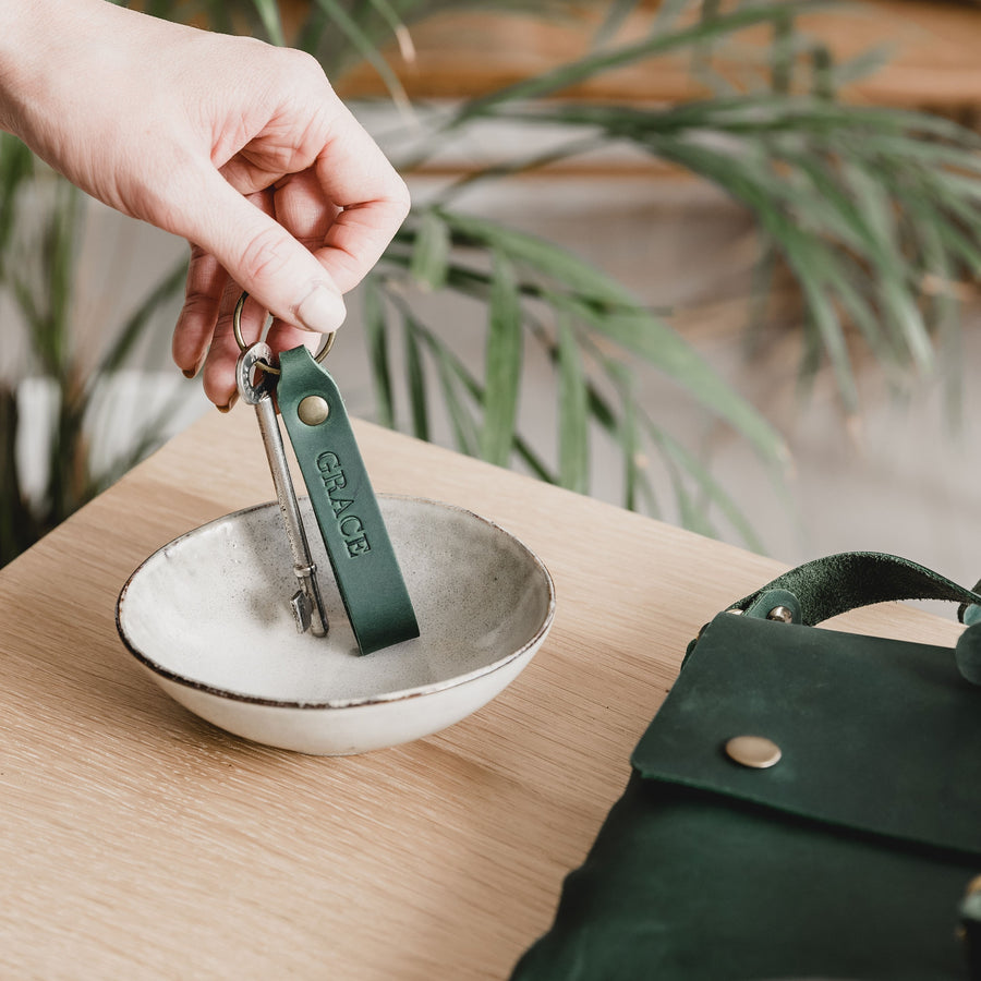 leather personalised keyring in use 