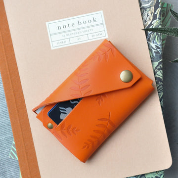 orange botanical leather wallet 