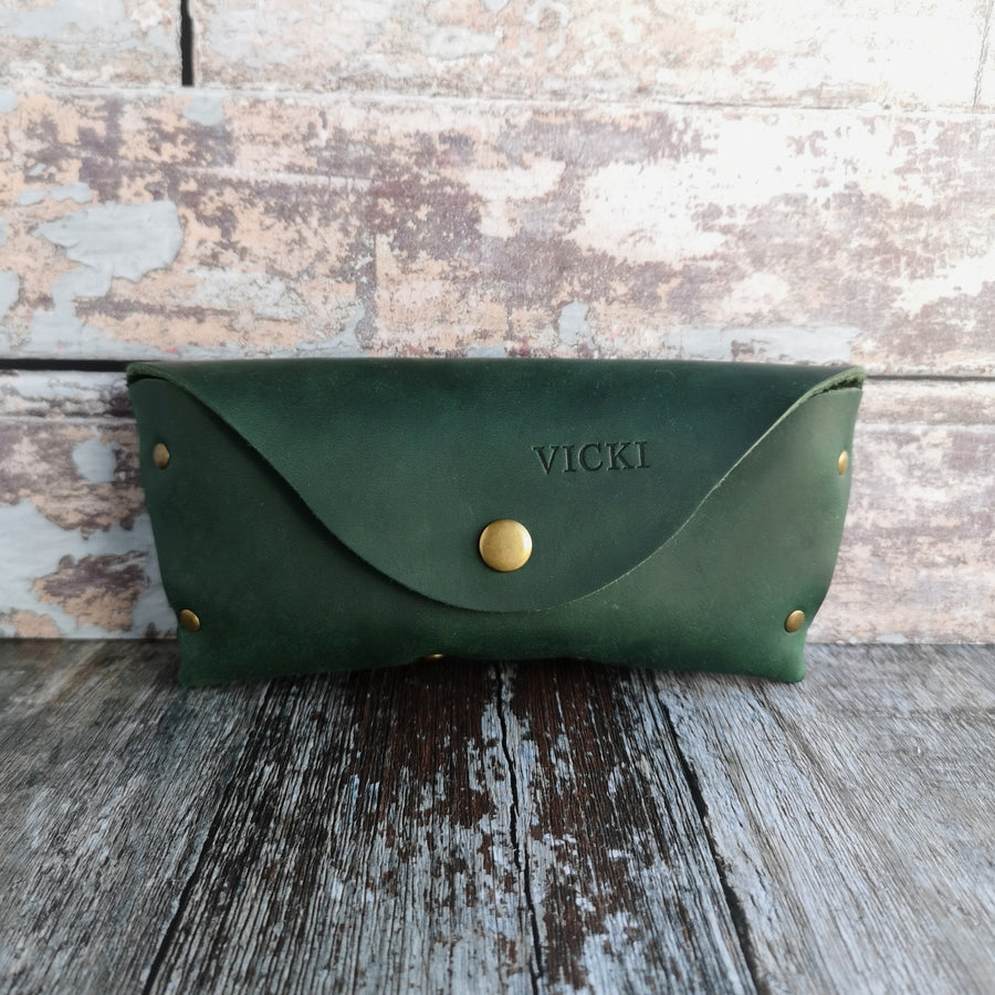 green leather glasses case