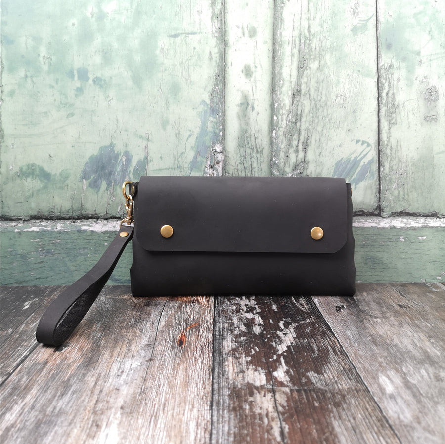 black leather wristlet bag