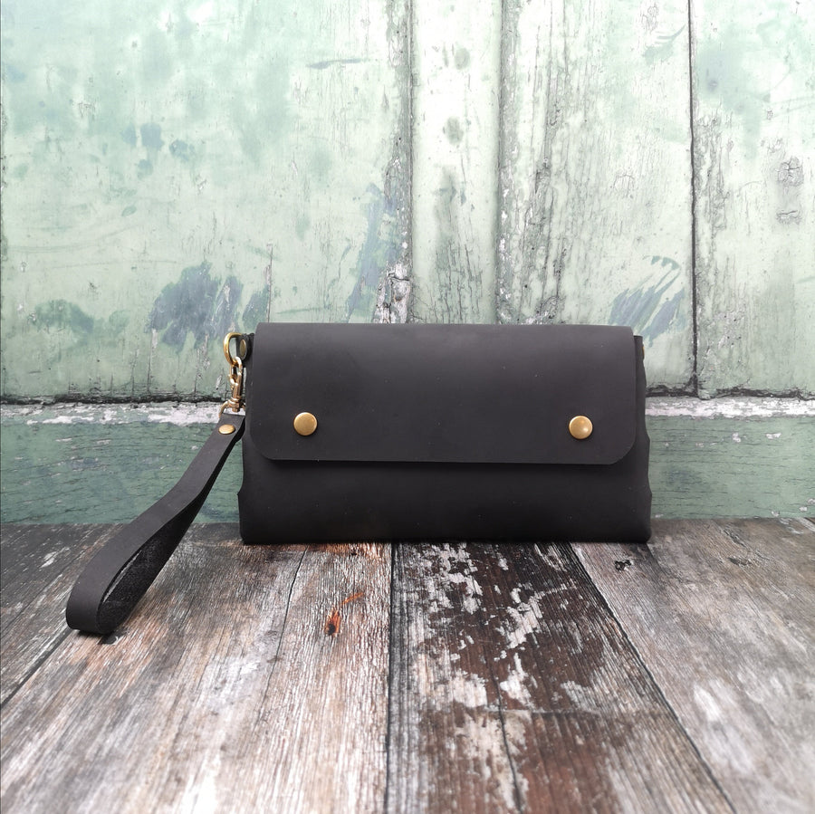 black leather wristlet bag
