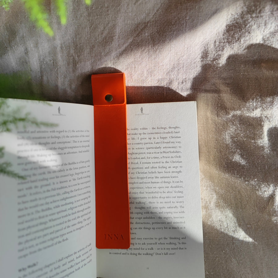 orange bookmark in book