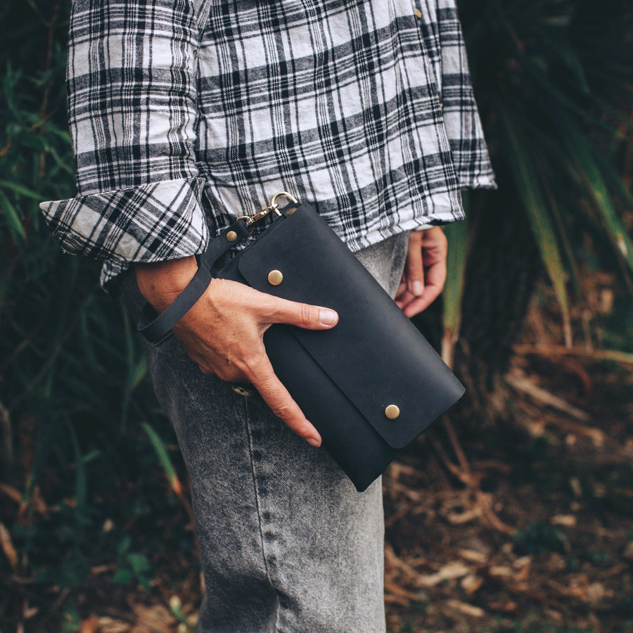 Black leather clutch bag 