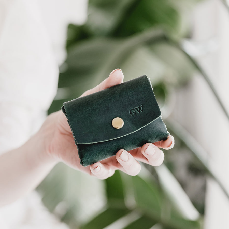 green leather purse