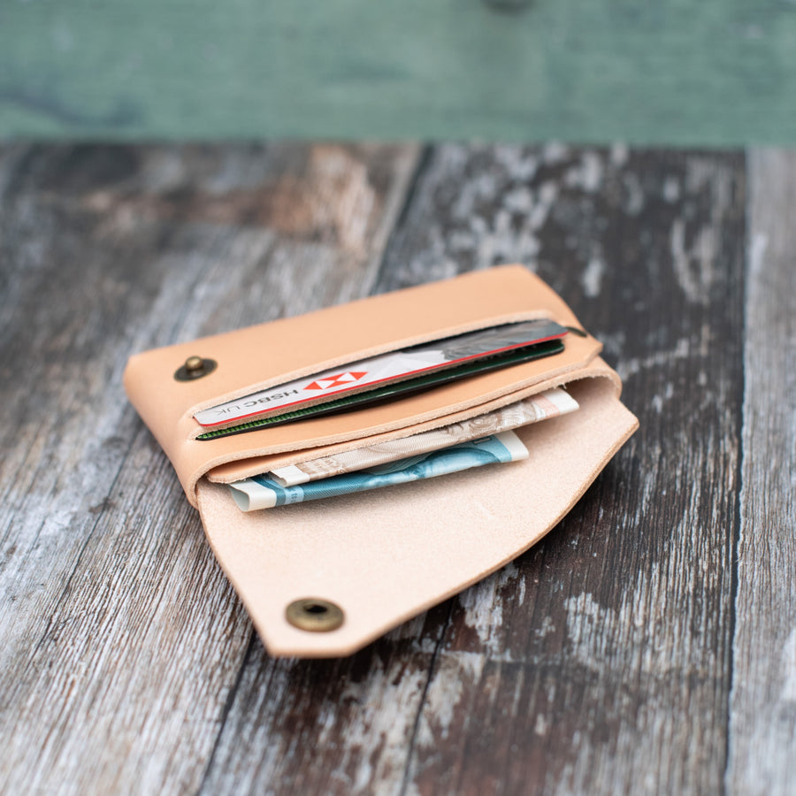 italian natural veg tan leather wallet in use 