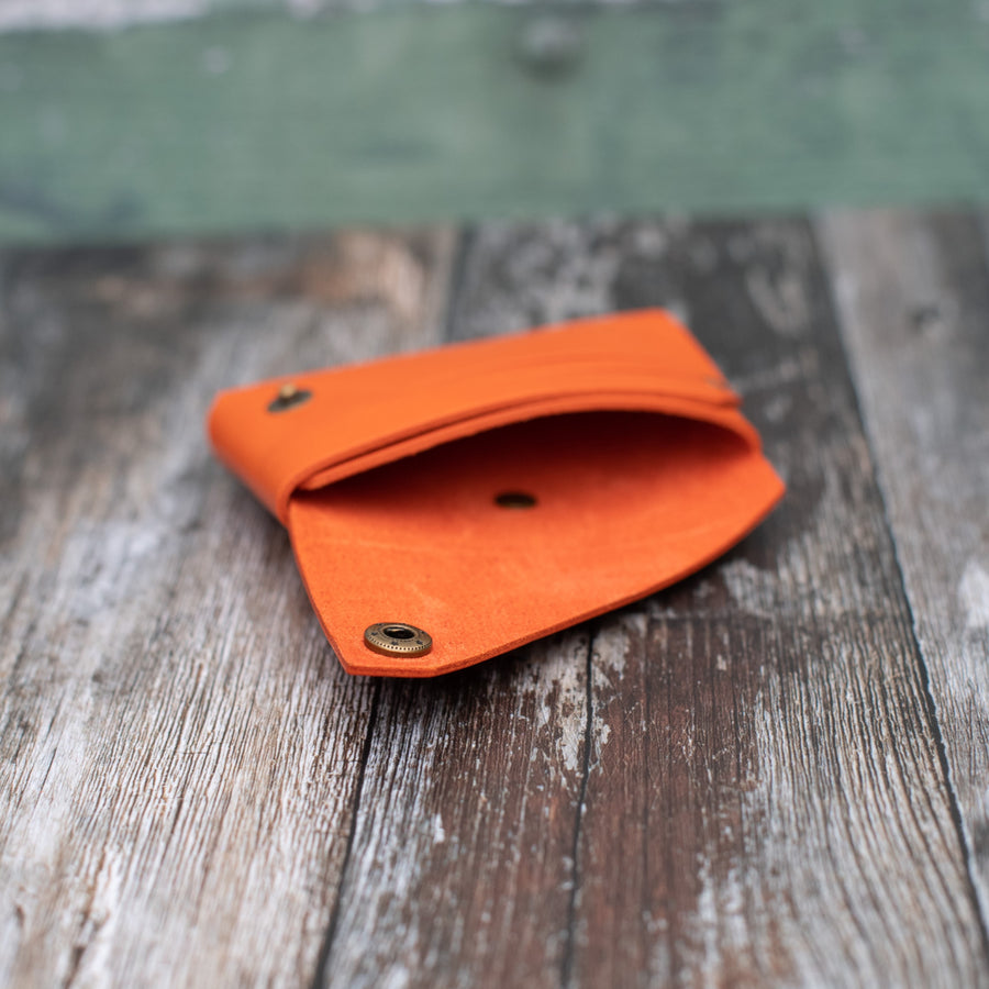 orange leather wallet open 